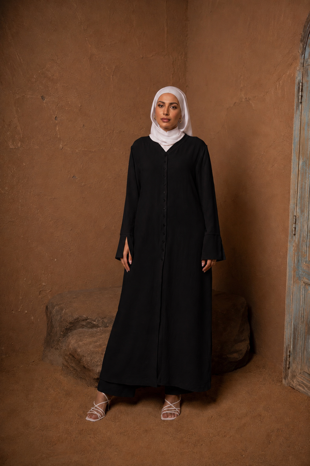 Woman wearing Black Longline Abaya and Pants Set by Urban Modesty