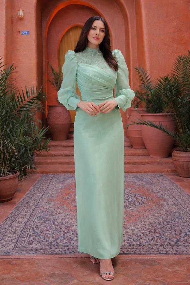 Woman wearing Taffeta Modest Gown by Urban Modesty