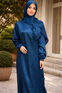 Woman wearing Blue Cheetah One Piece Salah Prayer Outfit in soft, breathable fabric, perfect for Hajj or Umrah.