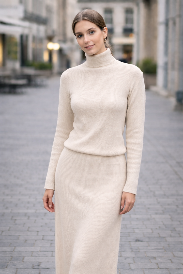 Woman modeling 2 Piece Sweater Skirt Set with long sleeves and A-line silhouette, perfect for adding sophistication to any outfit.
