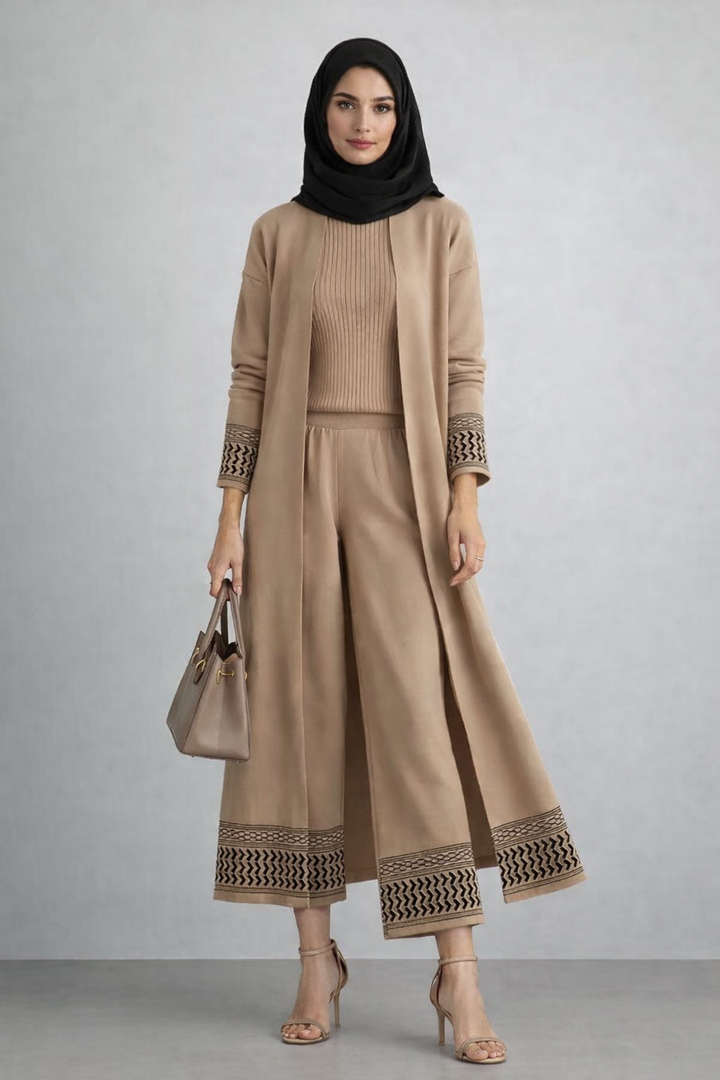 Woman modeling 3 Piece Kuffiyah Sweater Set with bell sleeves, A-line silhouette, and drawstring waistband.