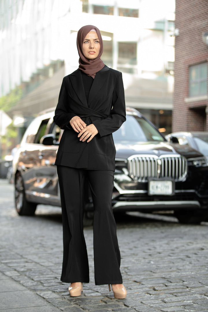Woman in black suit and hijab wearing Black Jacket and Pants Suit Set