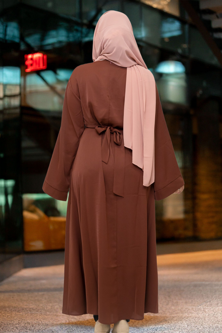 Brown kimono sleeve abaya maxi dress with light pink hijab