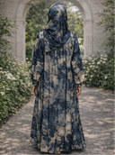 Rear view of Blue Abstract One Piece Salah Prayer Outfit in a garden setting.