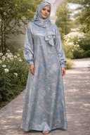 Blue Vines One Piece Salah Prayer Outfit in breathable fabric, perfect for Hajj or Umrah, modeled in a garden setting.