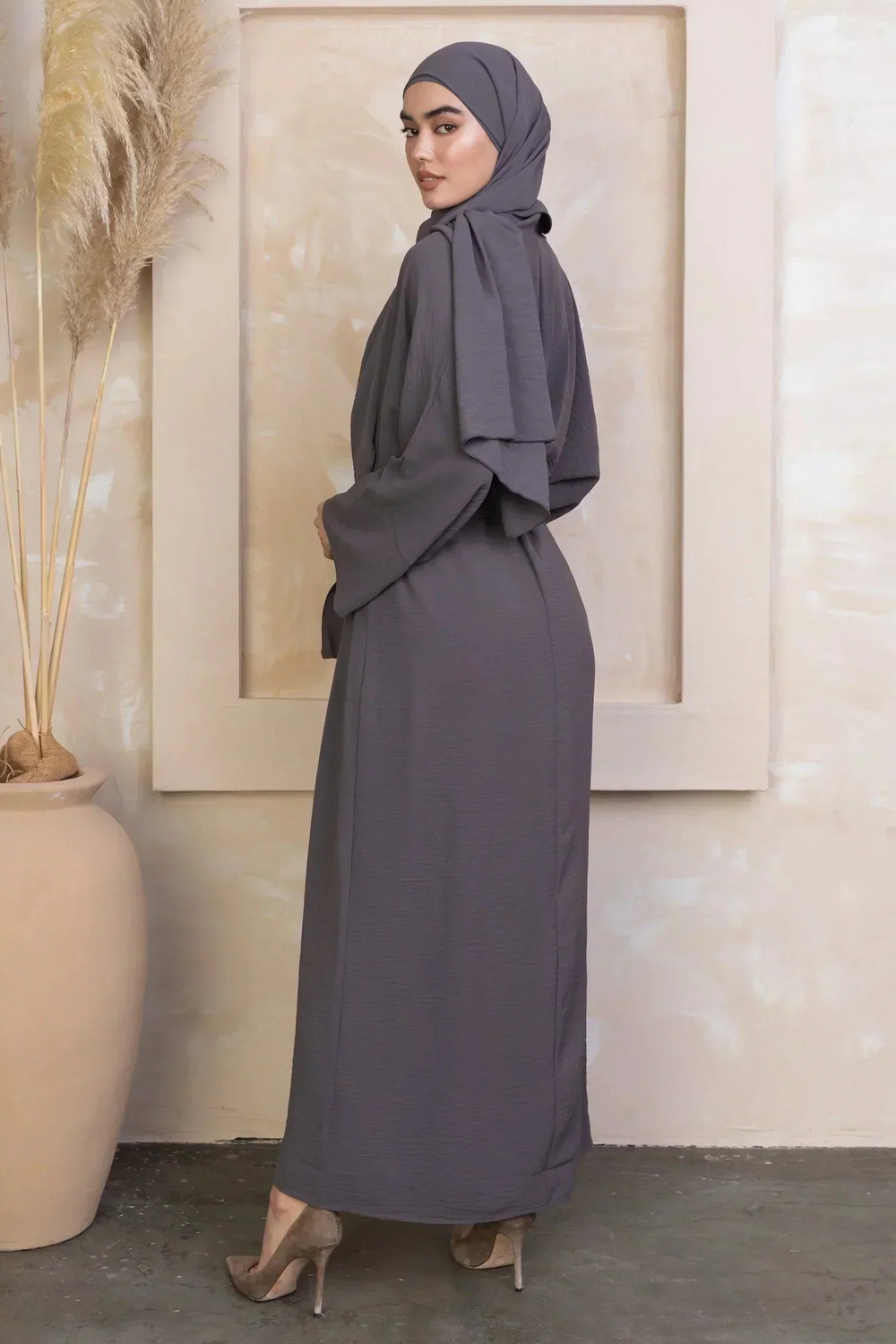 Gray modest dress with hijab from four-piece abaya set