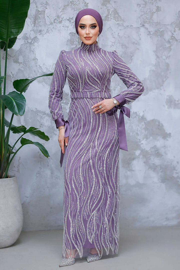 Lilac Beaded Gown with intricate detailing and slim fit, showcasing elegance with a crew neckline and back zipper.