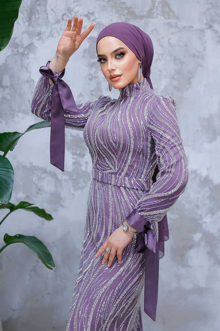 Lilac Beaded Gown by Urban Modesty with elegant bead detailing and a crew neckline, ideal for special events and formal occasions.