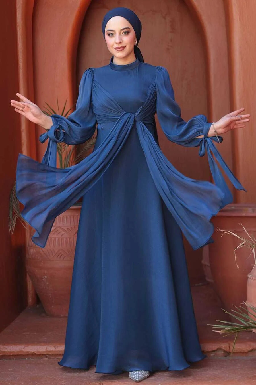 Navy Blue Organza Criss Cross Gown with fit and flare silhouette and crew neckline from Urban Modesty.