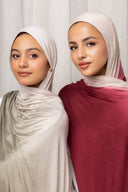 Two women wearing Ombré Jersey Hijab in different colors, showcasing lightweight and effortless draping, perfect for easy styling.