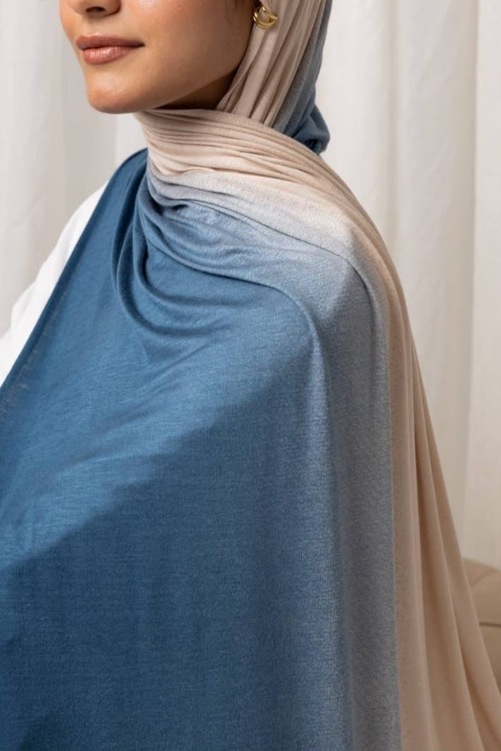 Ombré Jersey Hijab in blue and beige, lightweight and versatile for easy draping.