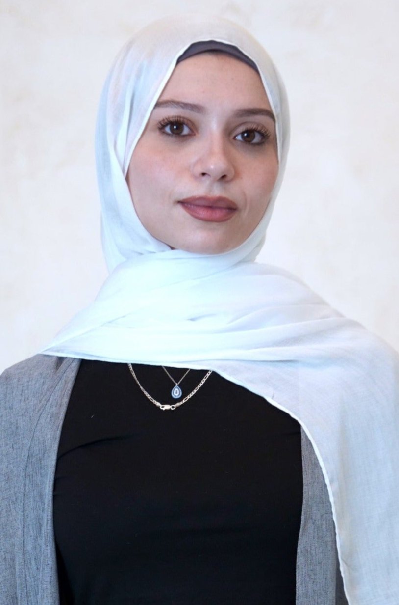 Woman wearing White Fringe Edge Modal Hijab styled with gray cardigan and black top