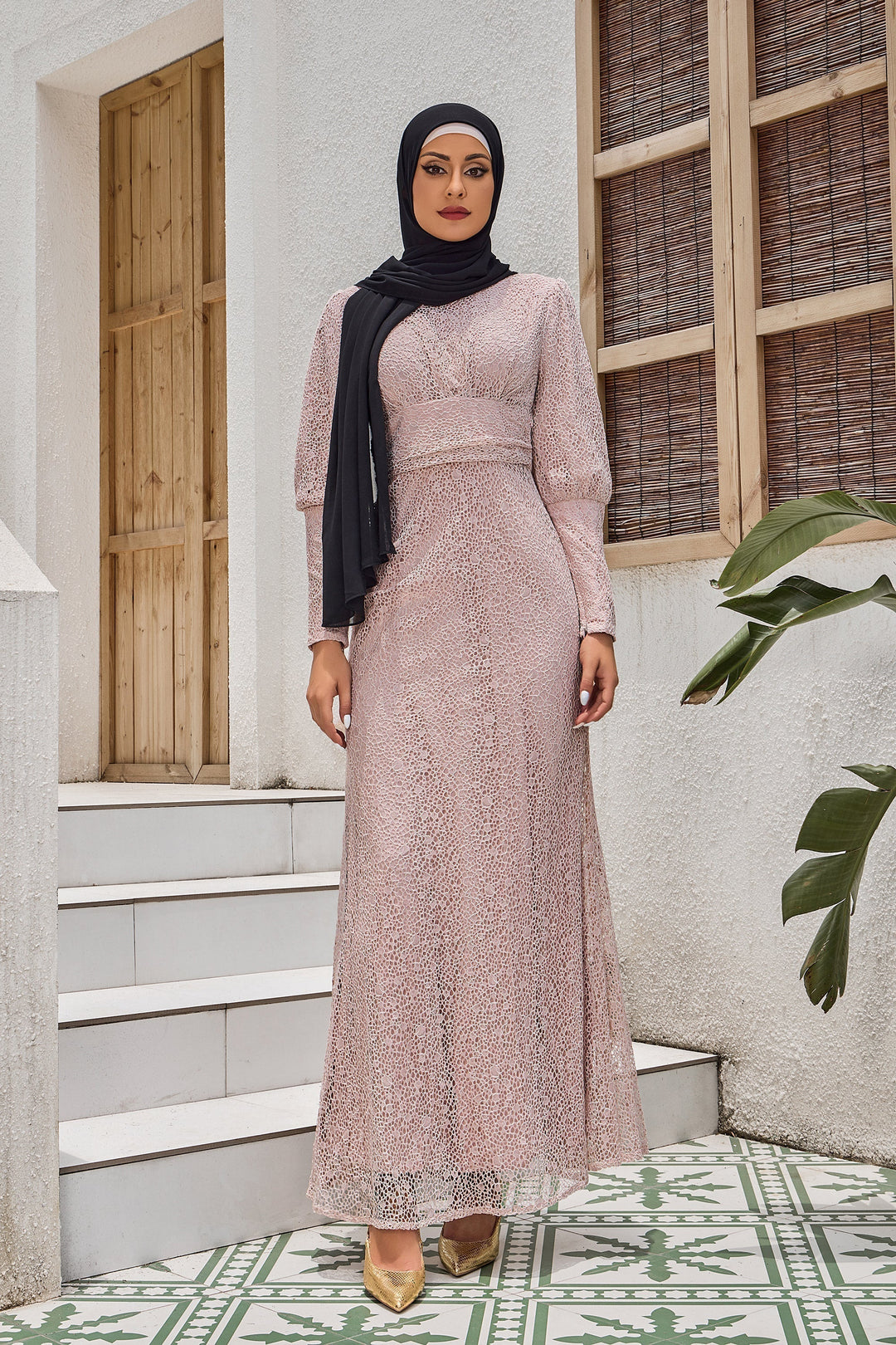 Woman wearing Beige Lace Ruched Waist Long Sleeve Gown from the clearance collection