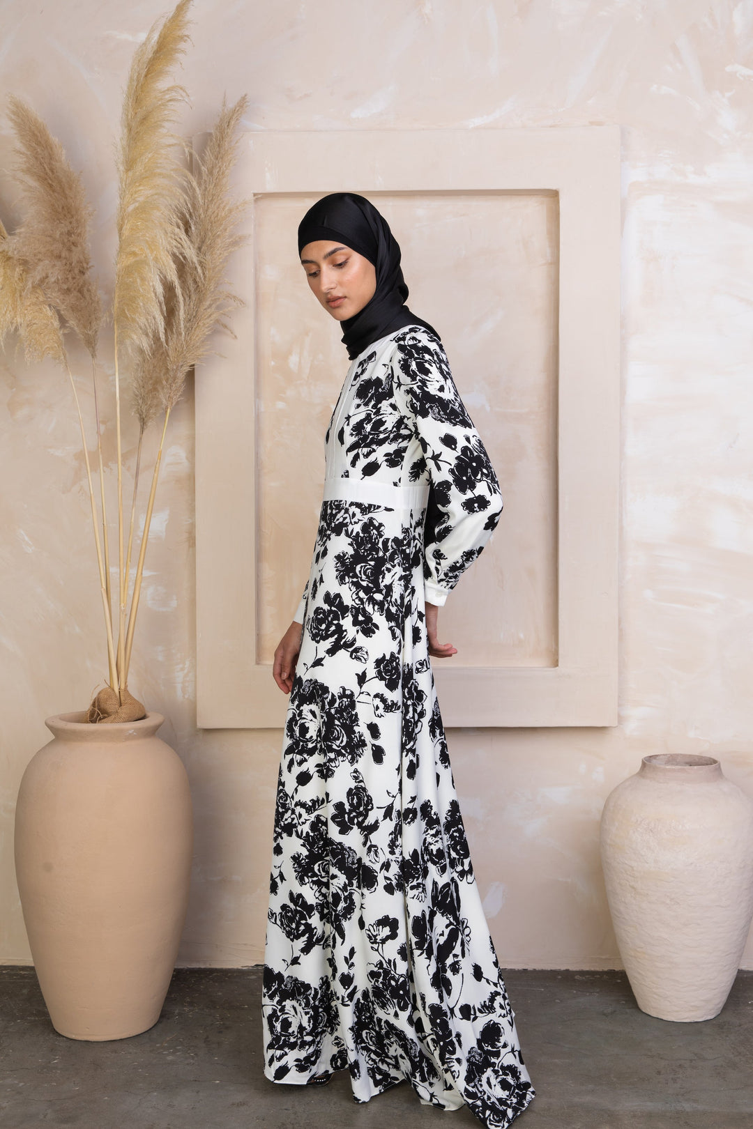 Black and White Floral Maxi Dress with Sleeves showcasing elegant white floral patterns