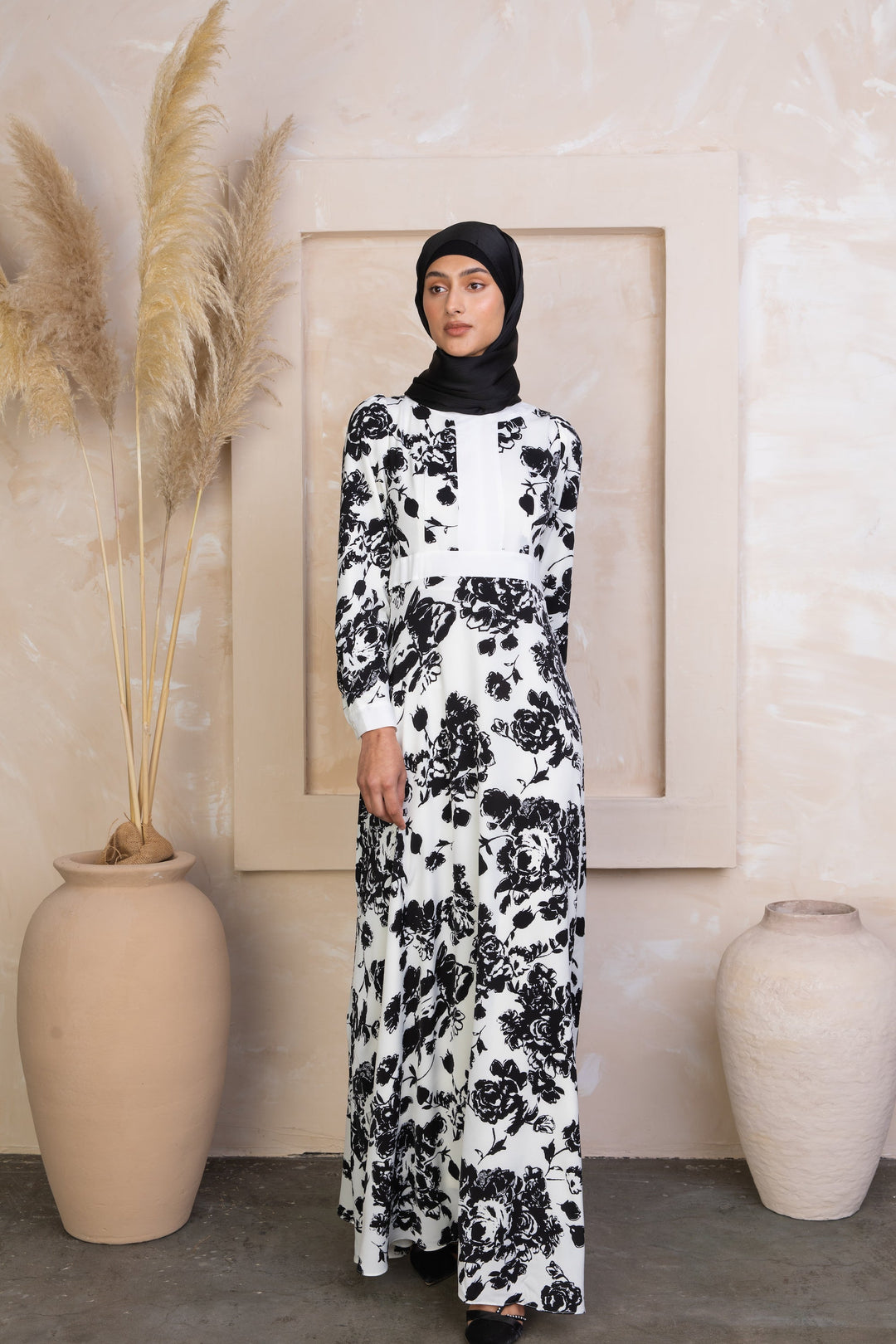 Black and White Floral Maxi Dress With Sleeves featuring elegant white floral design