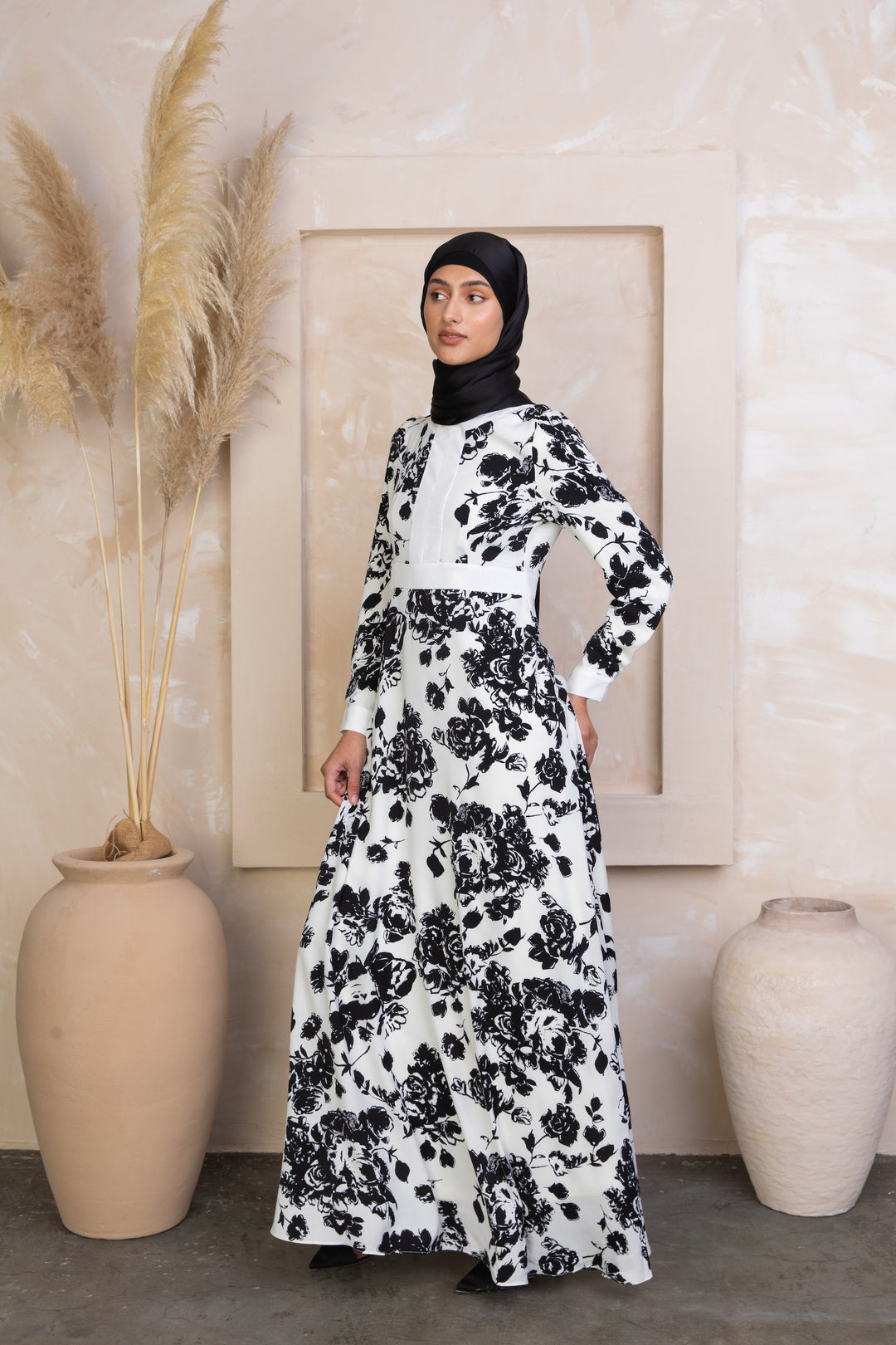 Black and White Floral Maxi Dress With Sleeves featuring elegant white floral design