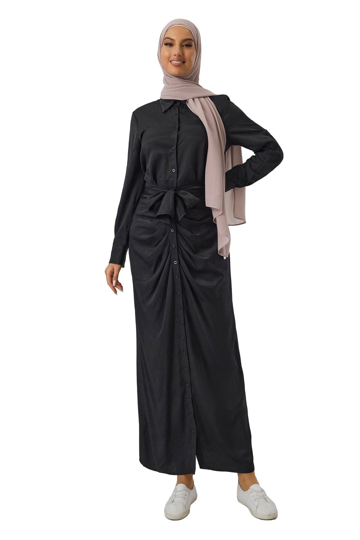 Woman in black dress and hijab wearing Black Button Down Shirt and Skirt Set