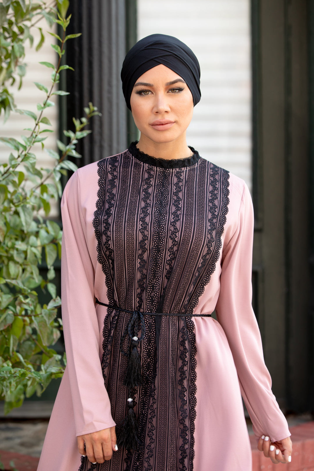 Woman in pink dress with black lace wearing Black Criss-Cross Cap Hijab UnderScarf