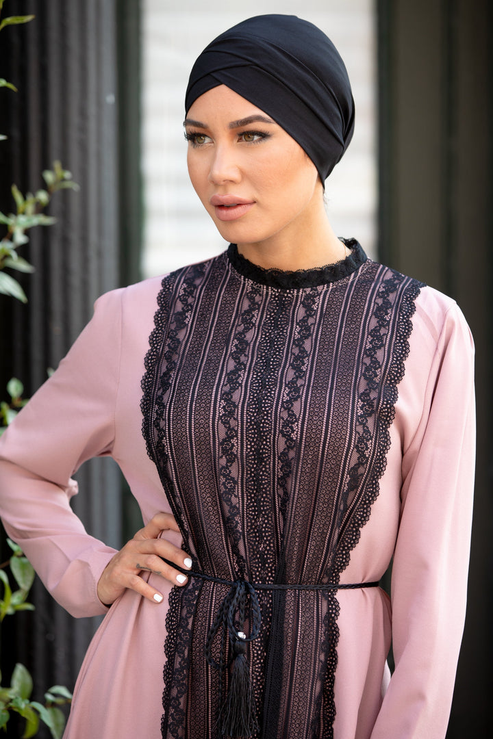 Woman in pink dress with black lace wearing a Black Criss-Cross Cap Hijab UnderScarf