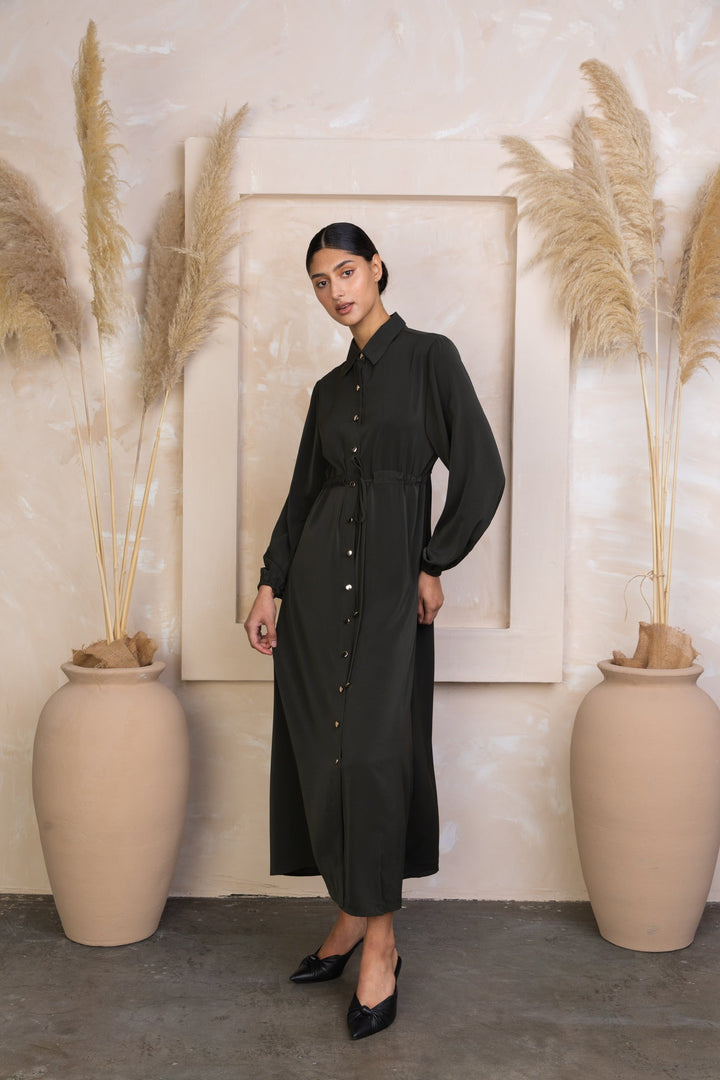 Long-sleeved button-down dress styled as a Black Drawstring Non-Sheer Maxi Cardigan