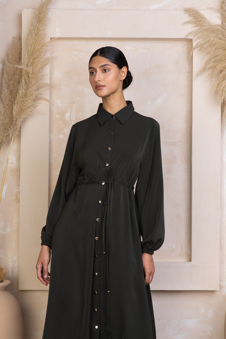 Long-sleeved button-down dress showcased with Black Drawstring Non-Sheer Maxi Cardigan