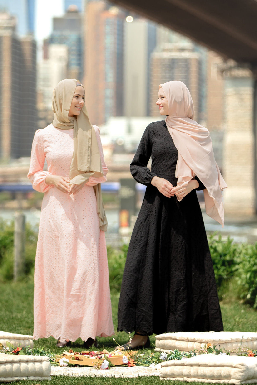 Two women in modest attire wearing the Black Eyelet Long Sleeve Maxi Dress