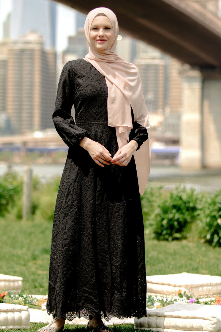 Elegant black eyelet long sleeve maxi dress paired with a stylish hijab