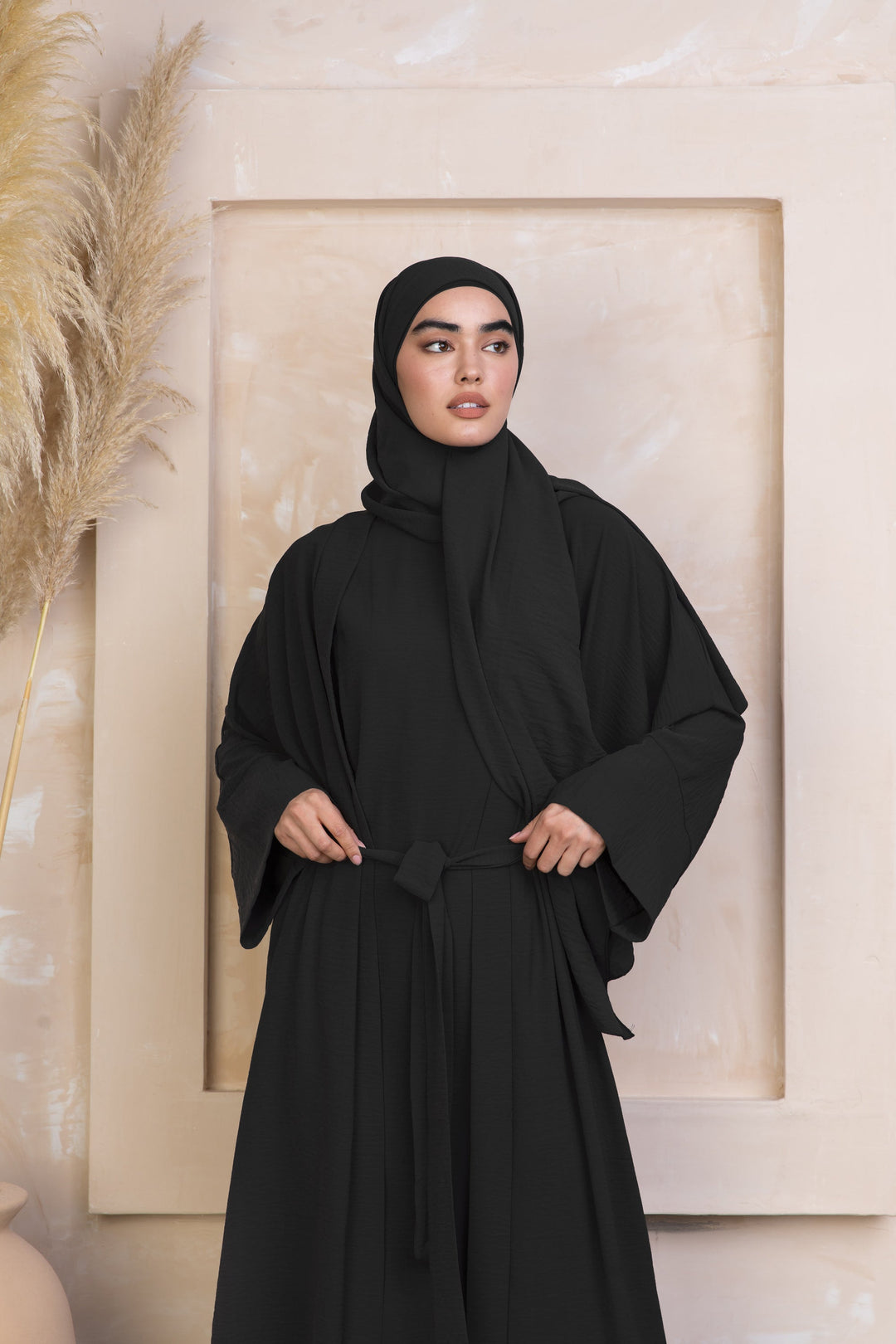 Black Four Piece Open Abaya Set featuring a modest dress and hijab for elegant style