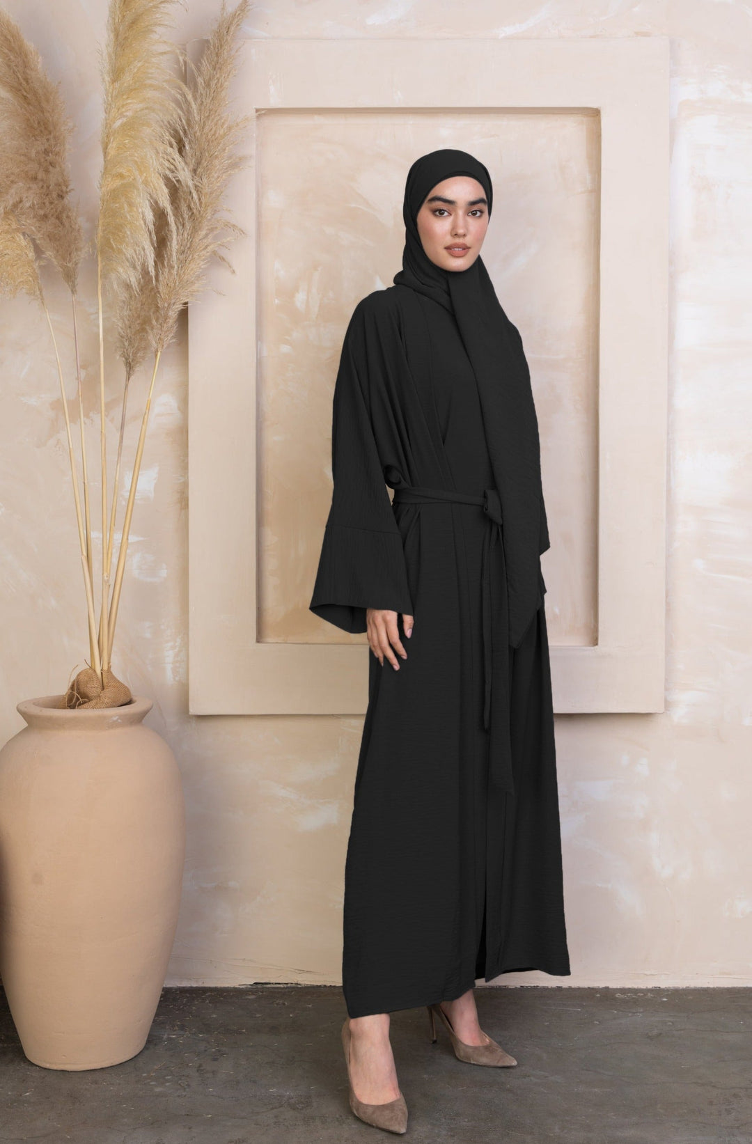 Black Four Piece Open Abaya Set featuring a modest dress and hijab for elegant style