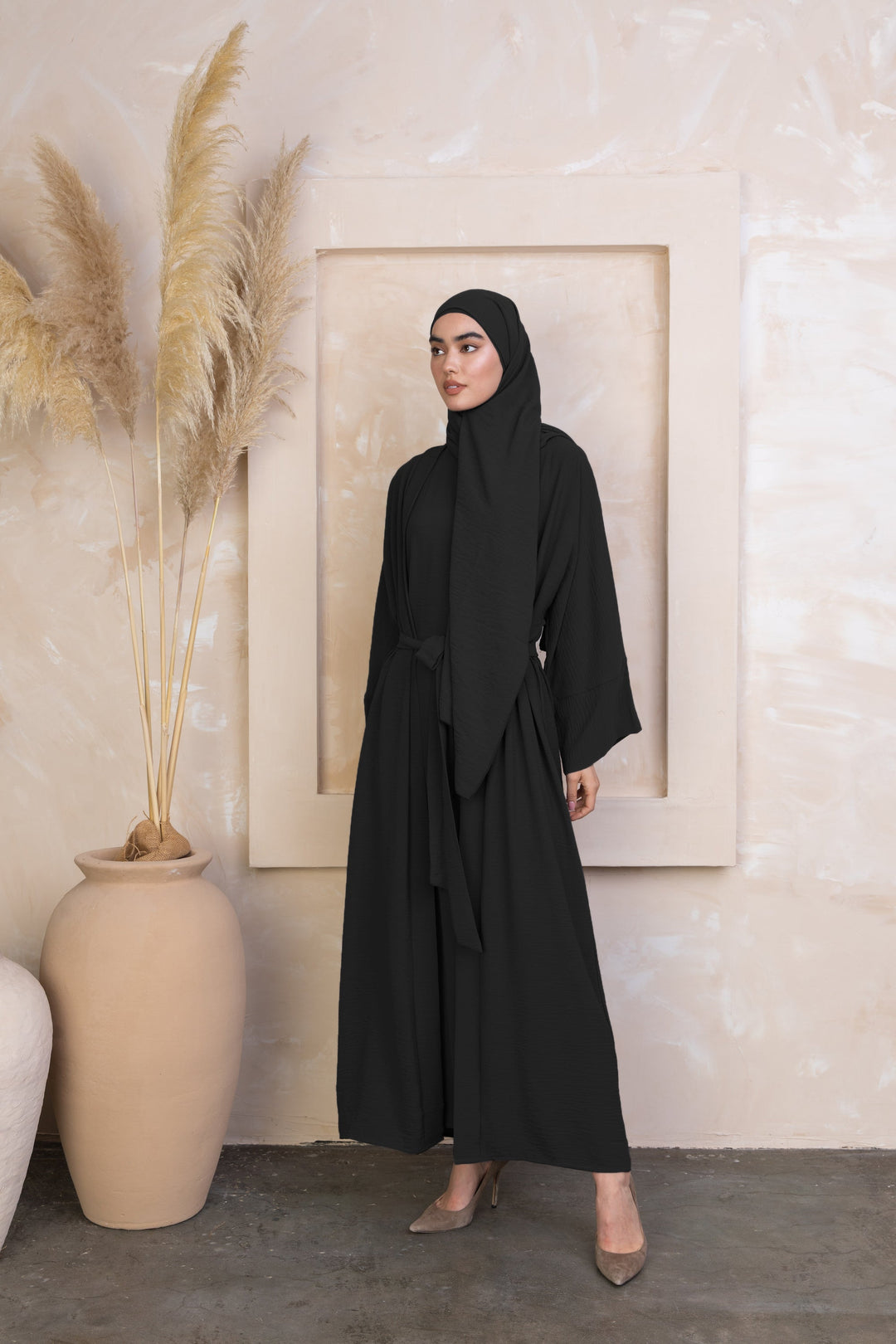 Black Four Piece Open Abaya Set featuring a modest dress and matching hijab