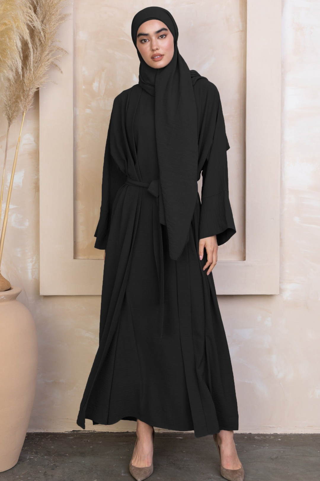 Black Four Piece Open Abaya Set featuring a modest dress and hijab for elegant styling