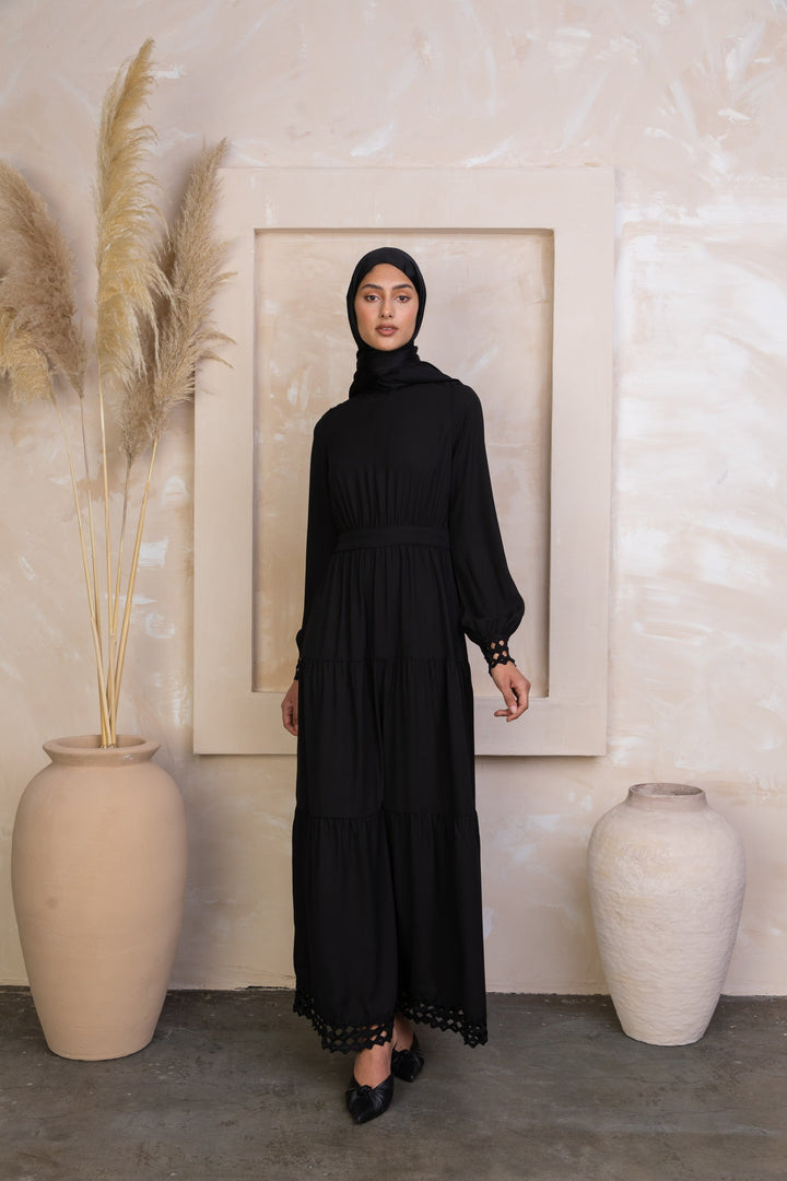 Black Lace Tiered Maxi Dress featuring a modest design with long sleeves and lace neckline