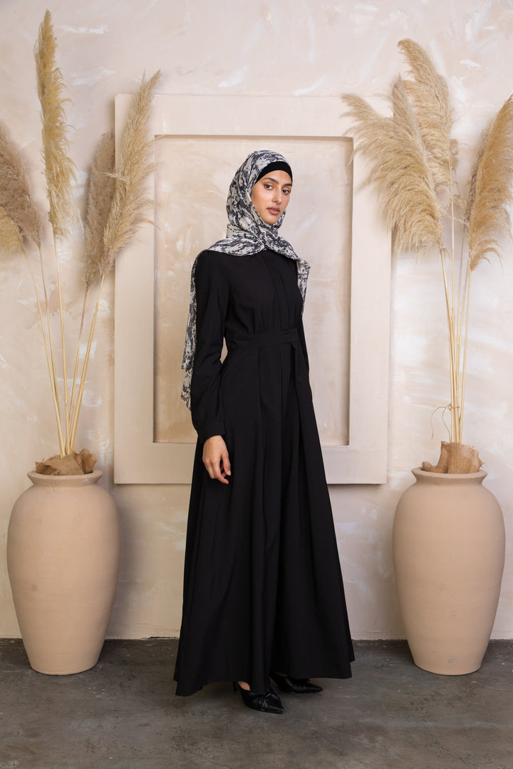 Elegant Black Lattice Abaya Maxi Dress with a patterned hijab for modest fashion