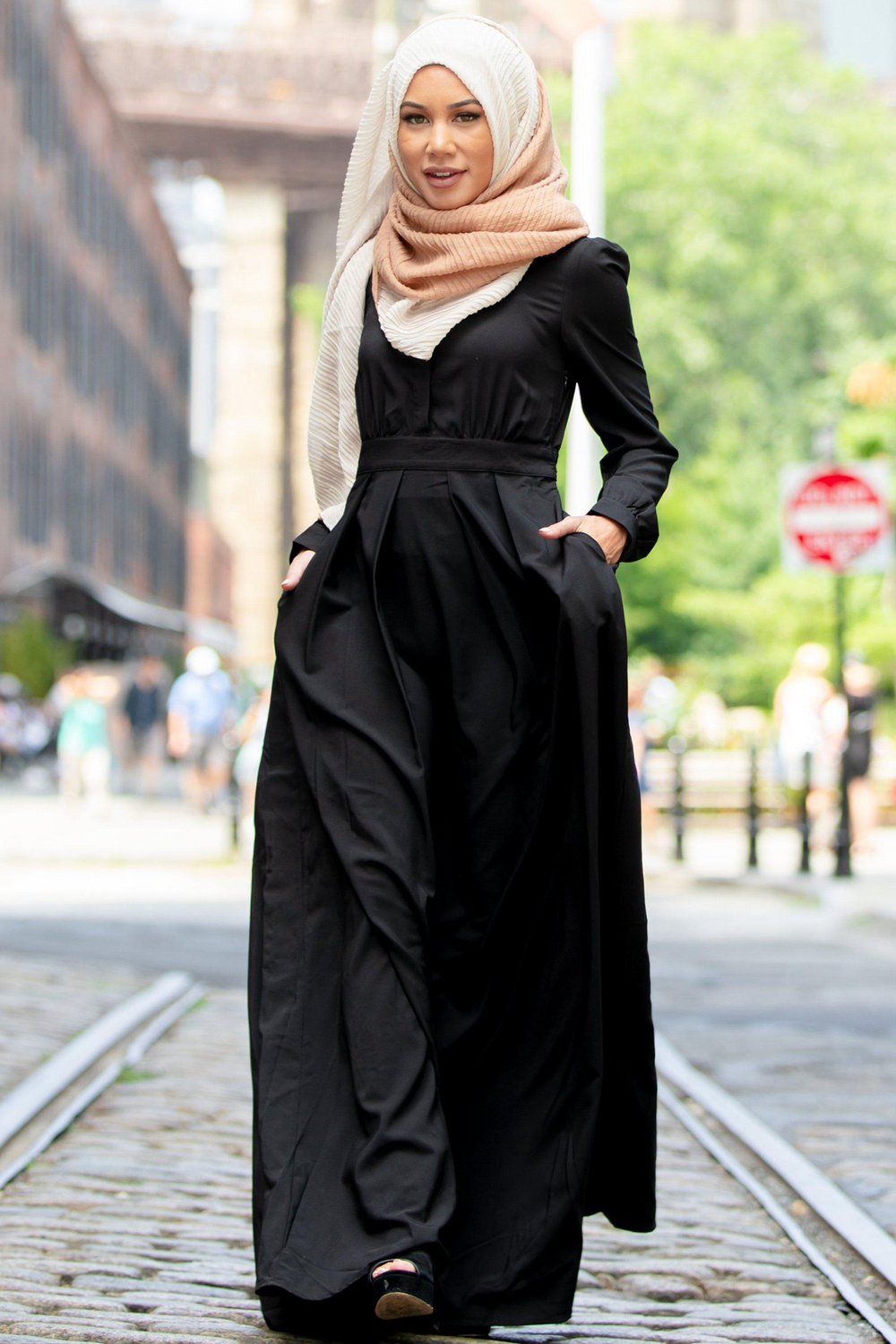 Elegant black lattice abaya maxi dress paired with a stylish hijab for modest fashion