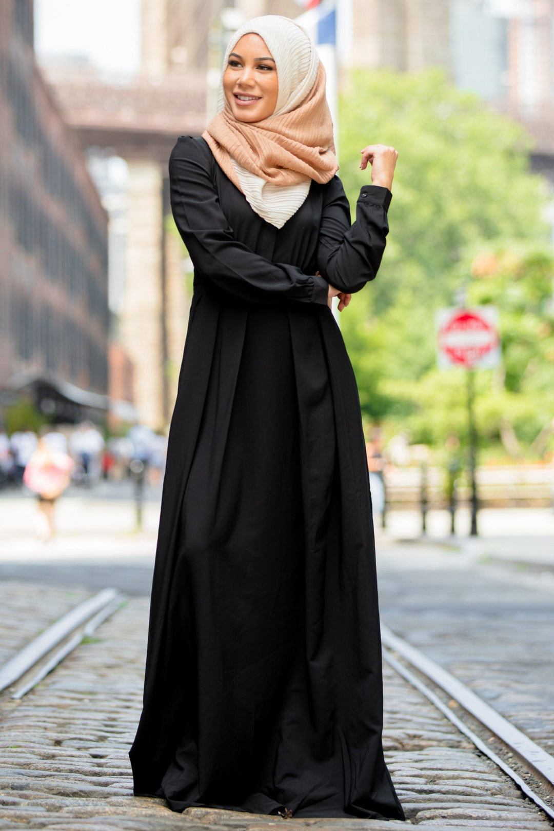 Elegant Black Lattice Abaya Maxi Dress paired with a stylish hijab for modest fashion