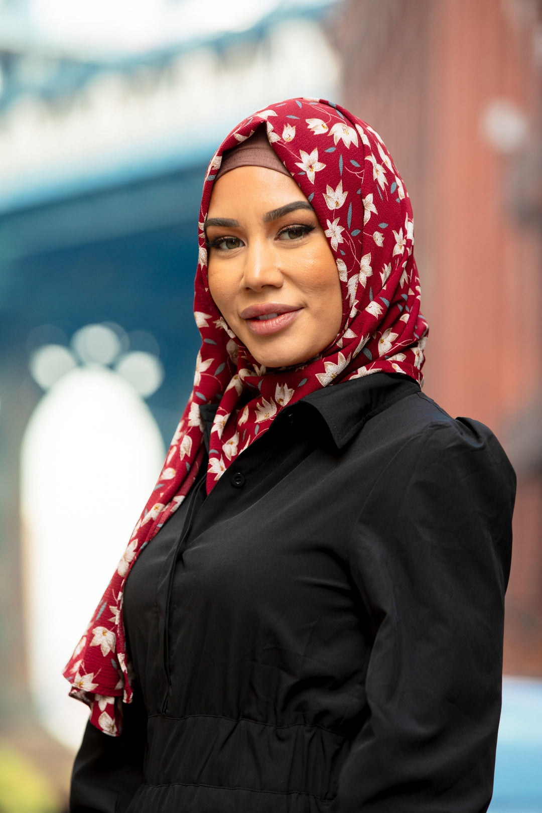 Woman in floral hijab wearing a stylish Black Lattice Jumpsuit on clearance