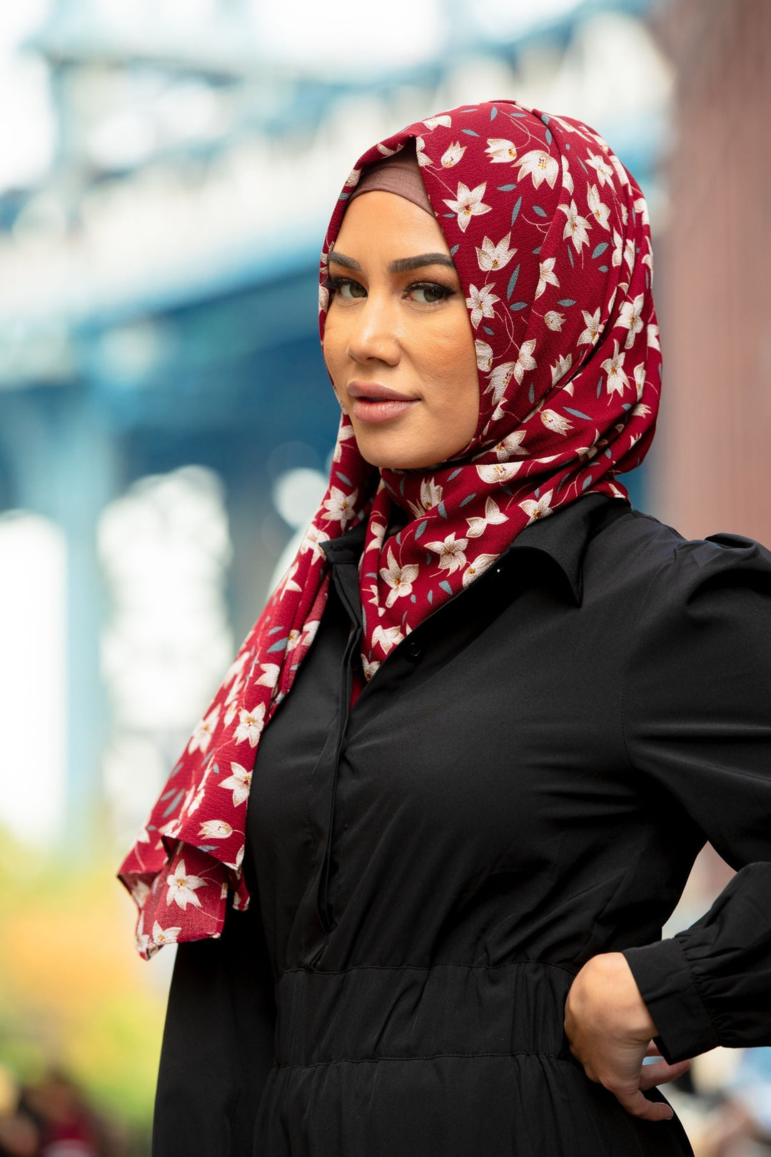 Burgundy floral hijab paired with a Black Lattice Jumpsuit to make a stylish outfit