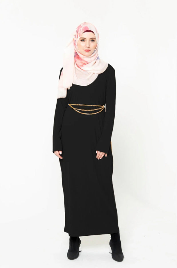 Woman in black dress with hijab wearing a Black Ribbed Long Sleeve Maxi Dress