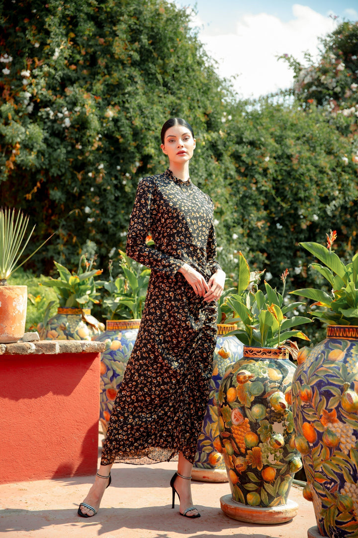 Black Ruched Floral Long Sleeve Maxi Dress featuring a vibrant floral print design