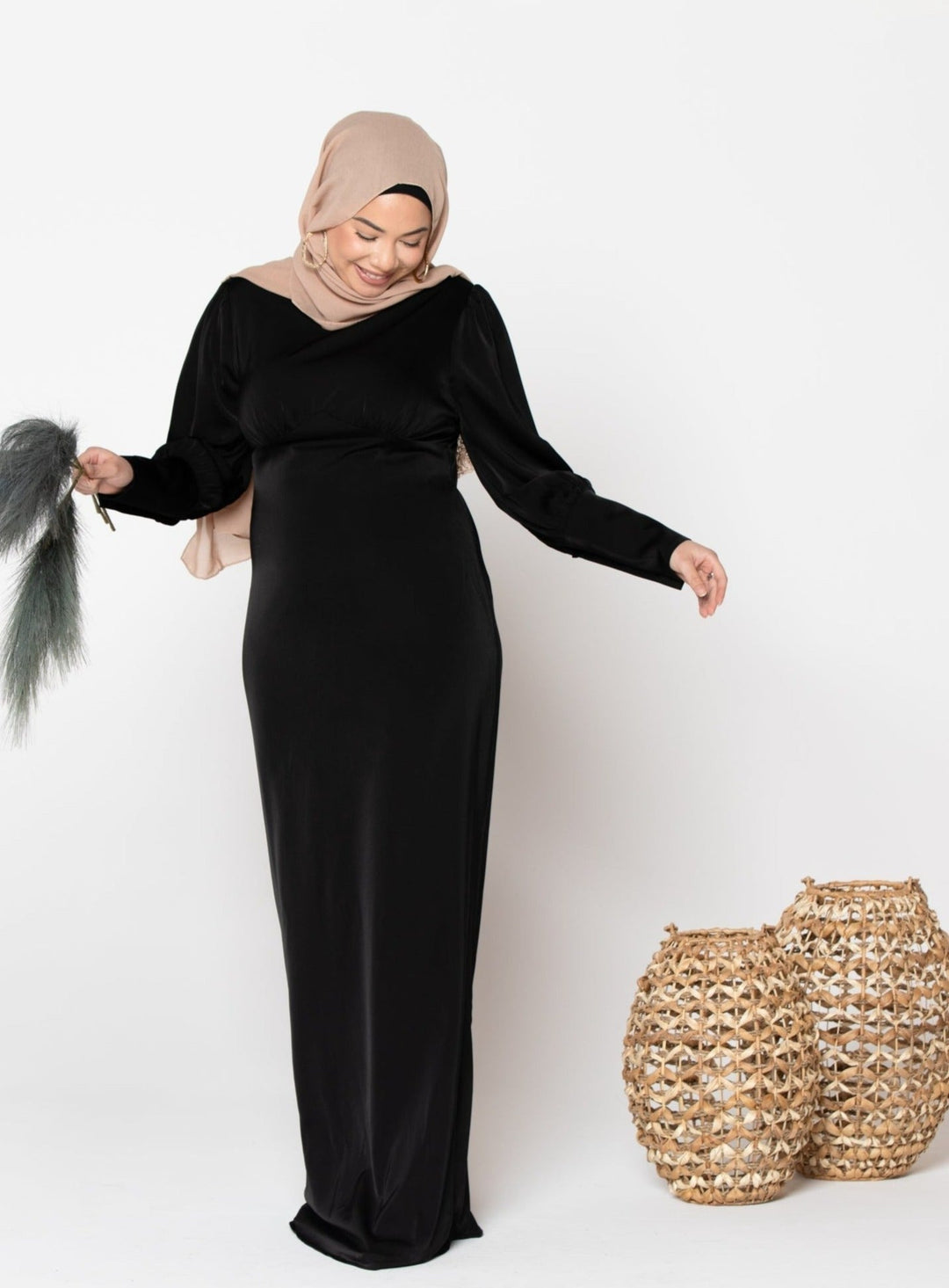 Black Satin Long Sleeve Maxi Dress styled with hijab, perfect for elegant occasions