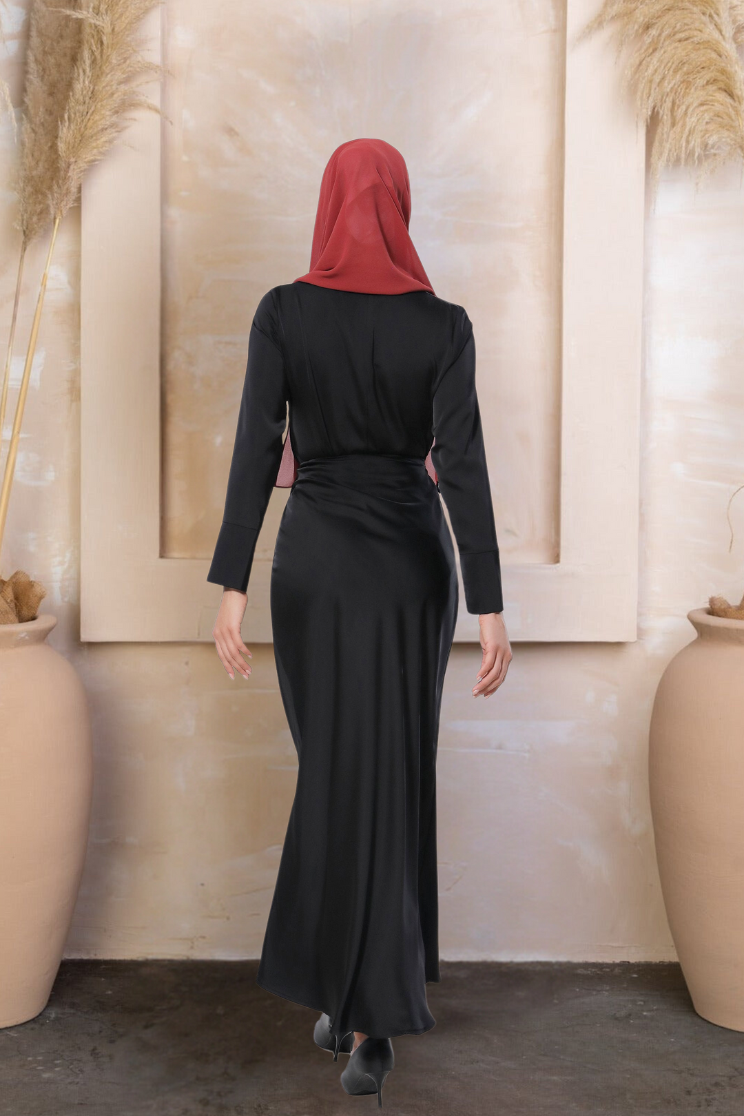 Woman in a black dress and red hijab showcasing a satin long sleeve skirt set