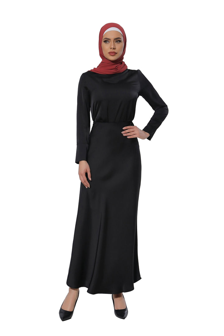 Elegant black satin long sleeve skirt set paired with a stylish red hijab