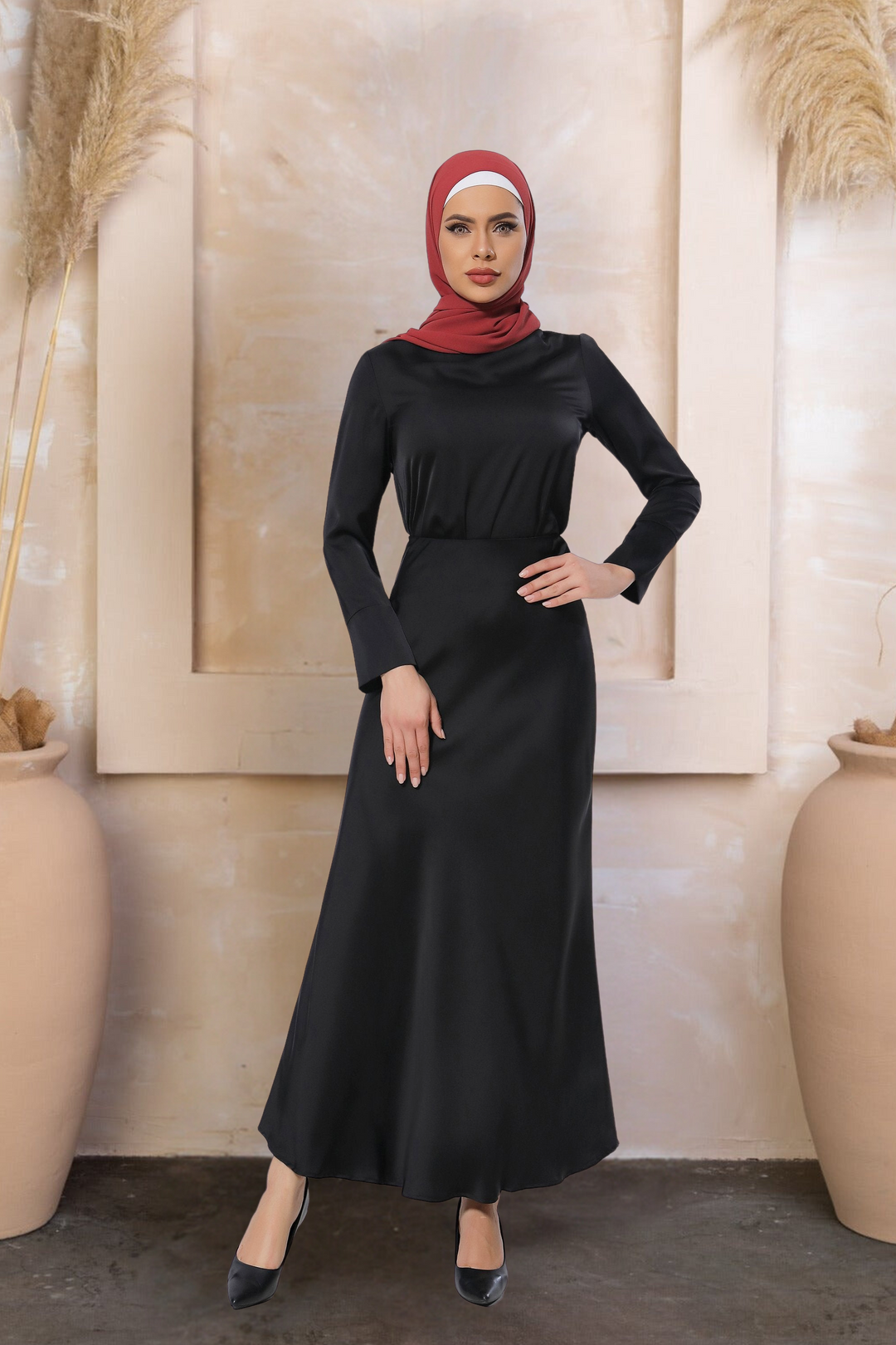 Woman in black dress and red hijab wearing a Satin Long Sleeve Skirt Set