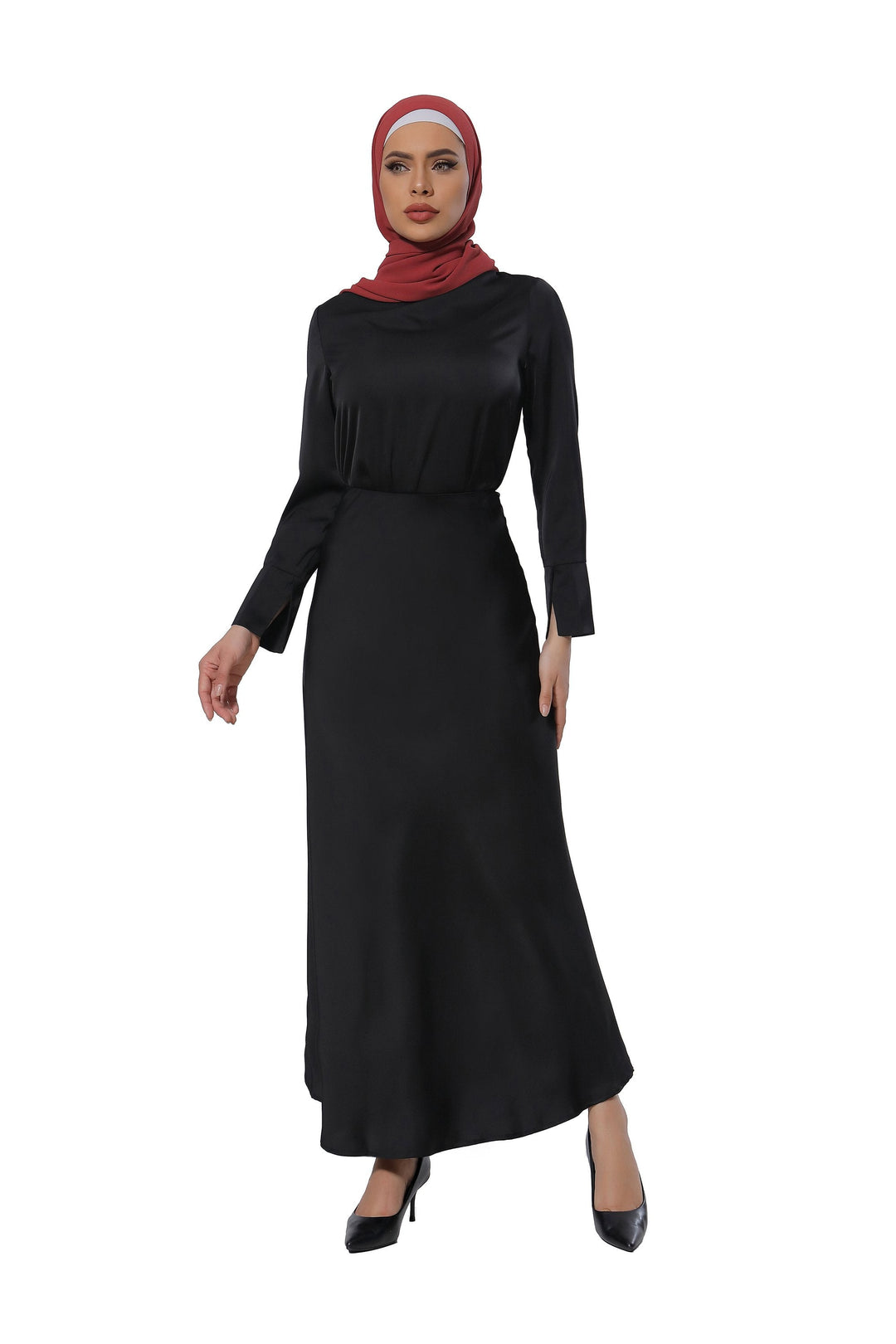 Woman in black satin long sleeve skirt set wearing a red hijab