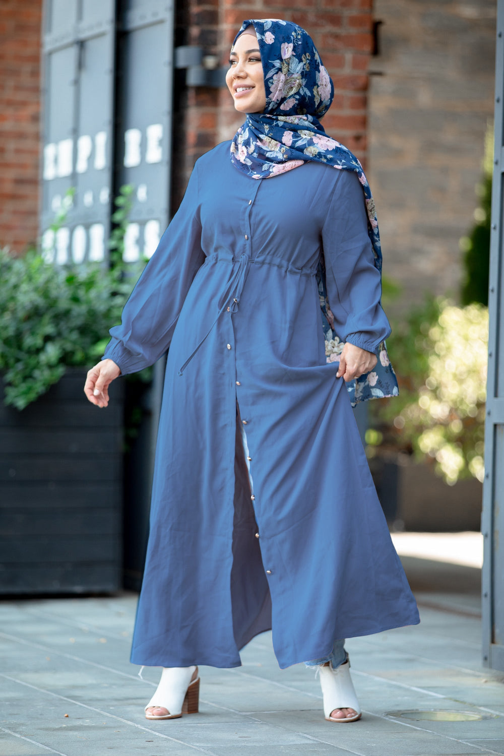 Woman in blue dress and floral hijab wearing Blue Button Down Drawstring Maxi Cardigan