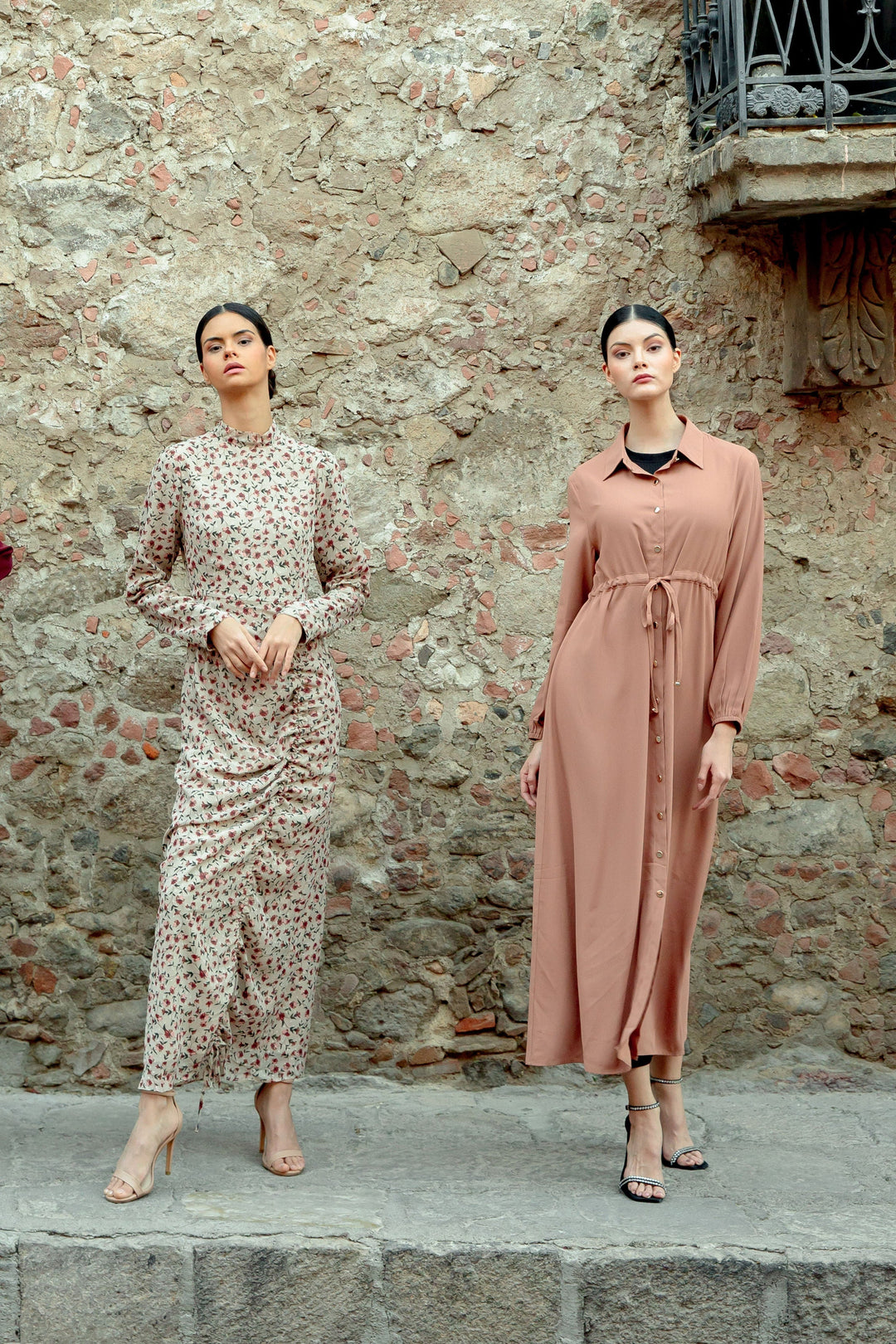 Two women in long dresses wearing a stylish Brown Button Down Drawstring Maxi Cardigan