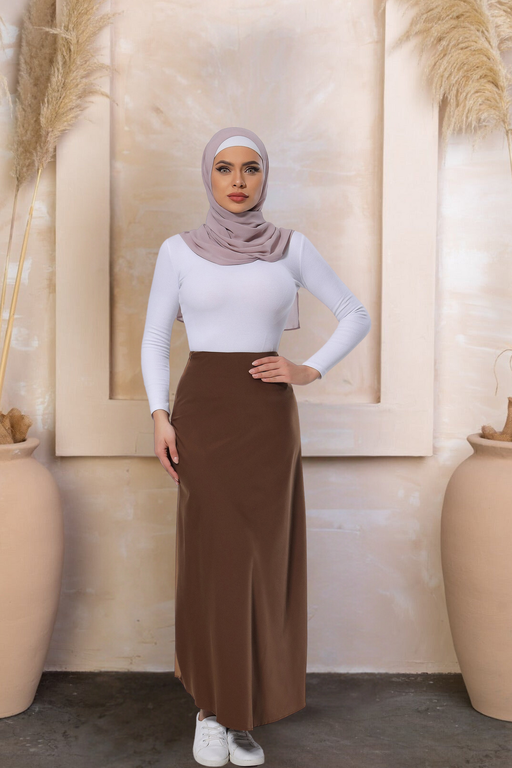 Woman in modest attire wearing a Brown Satin Maxi Skirt for elegant styling