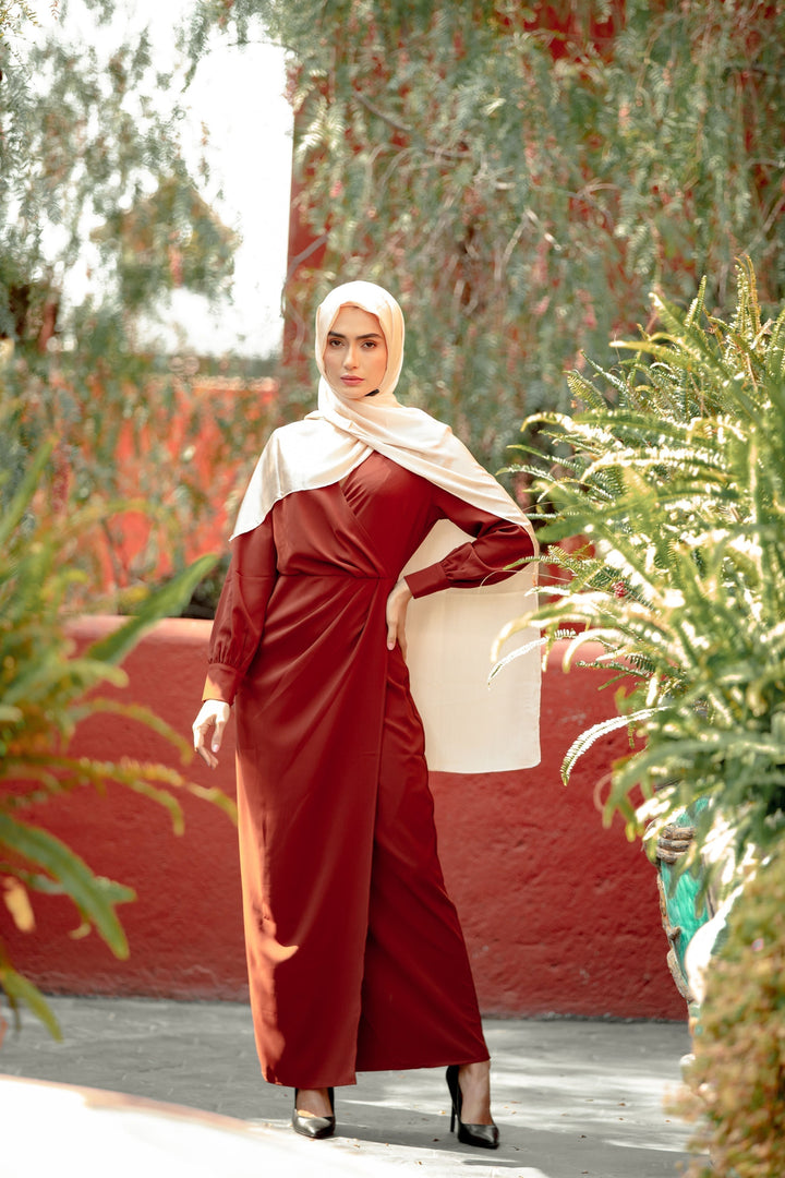 Elegant maroon dress with cream hijab showcasing a Brown Wrap Maxi Dress and criss cross neckline