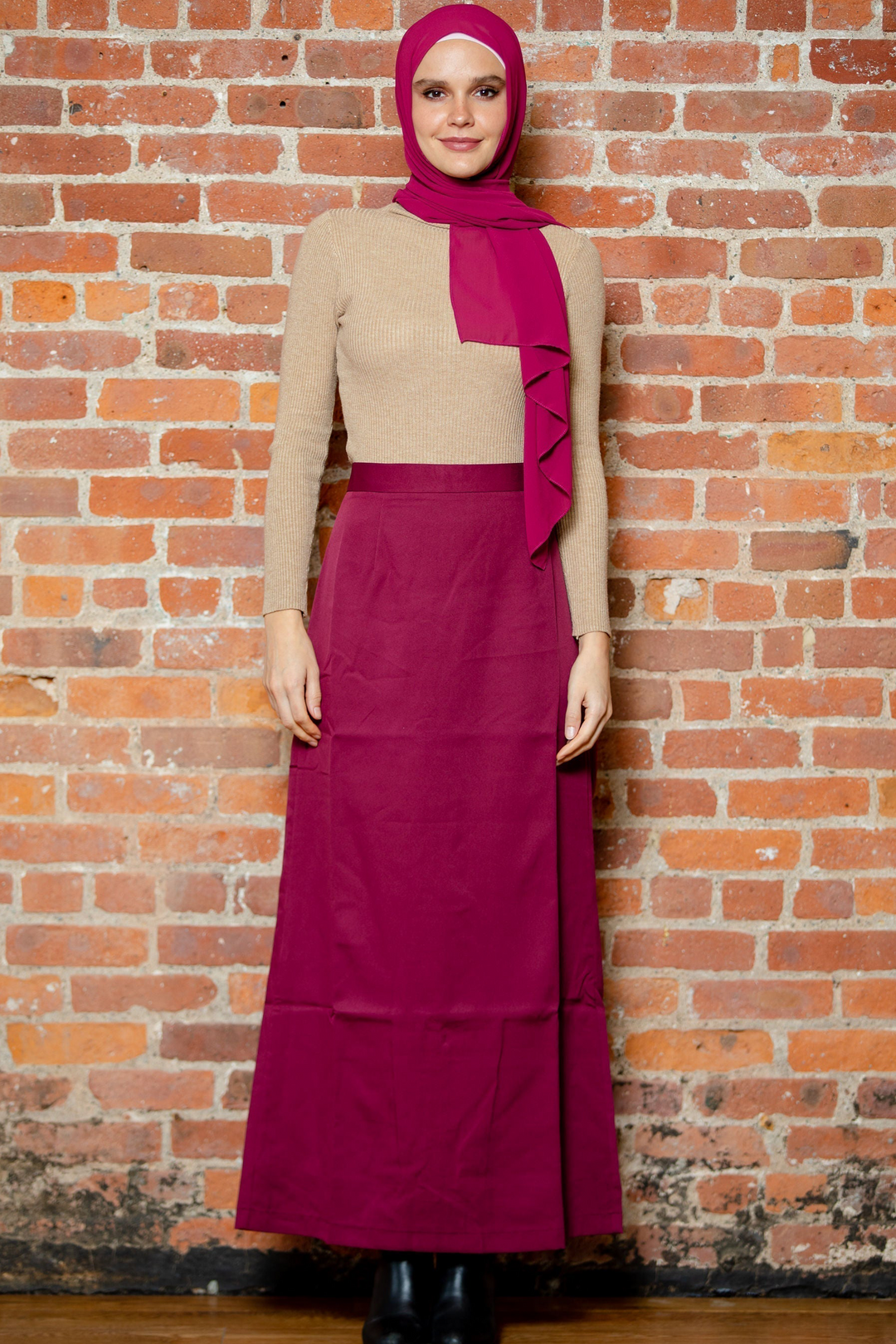 Woman in a hijab wearing a Burgundy Pencil Maxi Skirt on clearance sale