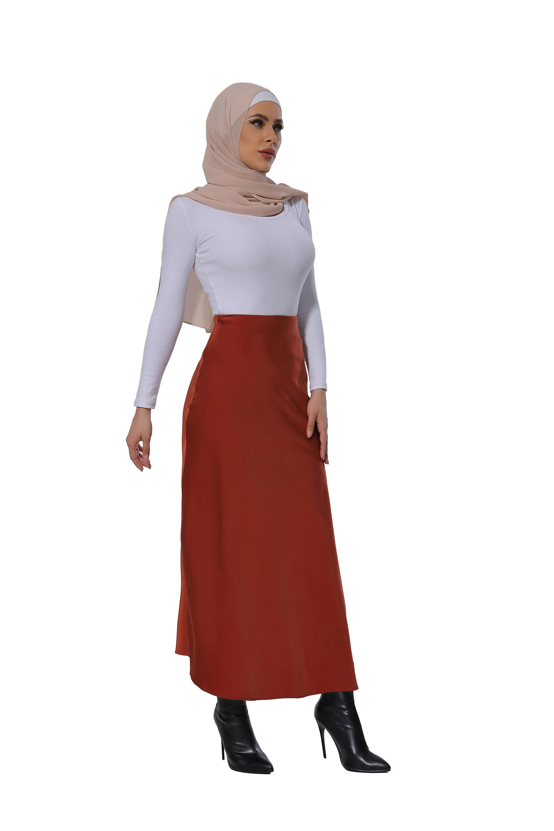 Woman in hijab modeling a Burnt Orange Satin Skirt with a white top